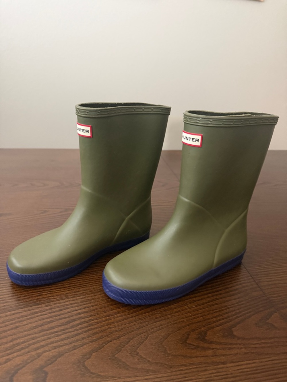 Hunter Kids First Classic Rain Boots in Hunter Green with Blue Sole